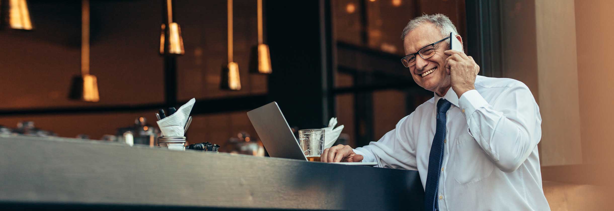 Business owner comparing online business accounts